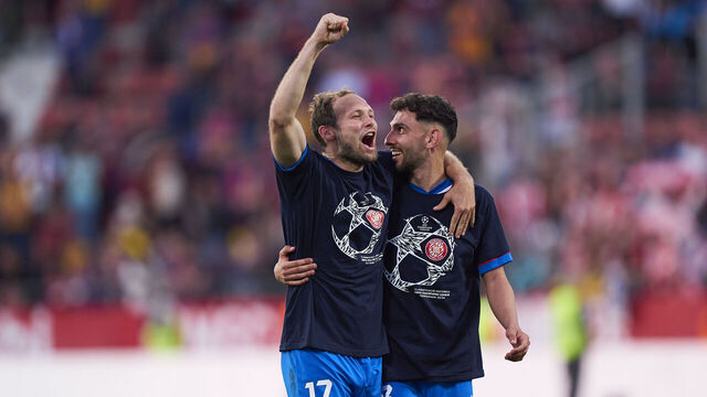 GIRONA, SPAIN - MAY 04: Players of Girona FC celebrate their classification to UEFA Champions League after the LaLiga EA Sports match between Girona FC and FC Barcelona at Montilivi Stadium on May 04, 2024 in Girona, Spain.
