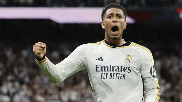 TOPSHOT - Real Madrid's English midfielder #5 Jude Bellingham celebrates scoring his team's third goal during the Spanish league football match between Real Madrid CF and FC Barcelona at the Santiago Bernabeu stadium in Madrid on April 21, 2024.