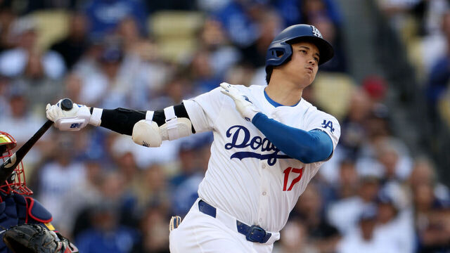 LOS ANGELES, CALIFORNIA - MAY 04: Shohei Ohtani #17 of the Los Angeles Dodgers reacts to his strikeout in front of Travis d'Arnaud #16 of the Atlanta Braves during the first inning at Dodger Stadium on May 04, 2024 in Los Angeles, California.
