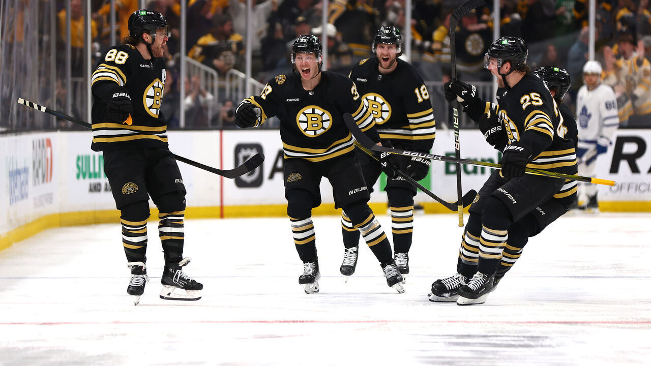 BOSTON, MASSACHUSETTS - MAY 04: David Pastrnak #88 of the Boston Bruins celebrates with his teammates after scoring the game winning goal against the Toronto Maple Leafs during overtime to win Game Seven of the First Round of the 2024 Stanley Cup Playoffs at TD Garden on May 04, 2024 in Boston, Massachusetts.