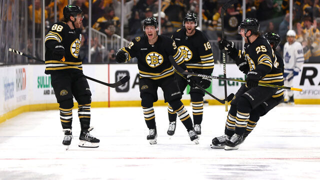 BOSTON, MASSACHUSETTS - MAY 04: David Pastrnak #88 of the Boston Bruins celebrates with his teammates after scoring the game winning goal against the Toronto Maple Leafs during overtime to win Game Seven of the First Round of the 2024 Stanley Cup Playoffs at TD Garden on May 04, 2024 in Boston, Massachusetts.