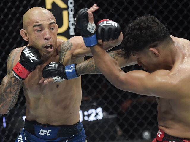 RIO DE JANEIRO, BRAZIL - MAY 04: (L-R) Jose Aldo of Brazil punches Jonathan Martinez in a bantamweight bout during the UFC 301 event at Farmasi Arena on May 04, 2024 in Rio de Janeiro, Brazil.
