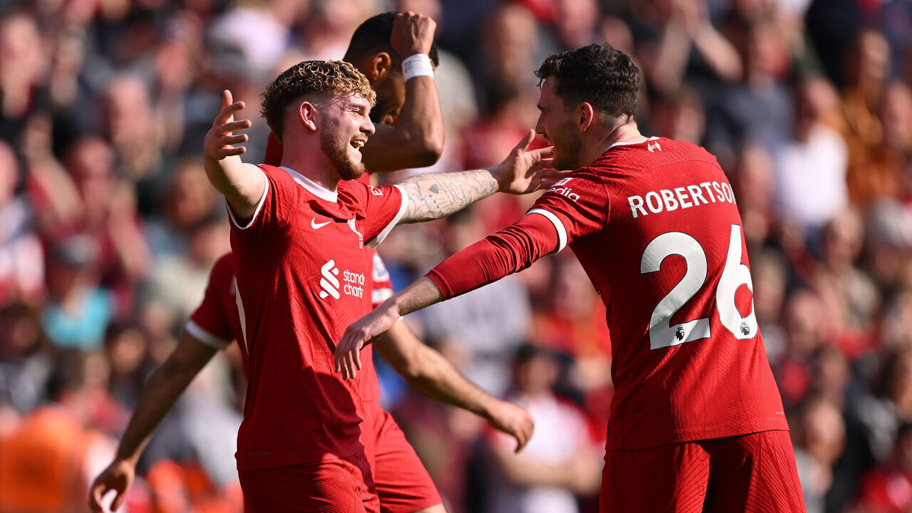 LIVERPOOL, ENGLAND - MAY 05: Andrew Robertson of Liverpool celebrates scoring his team's second goal with teammate Harvey Elliott during the Premier League match between Liverpool FC and Tottenham Hotspur at Anfield on May 05, 2024 in Liverpool, England.