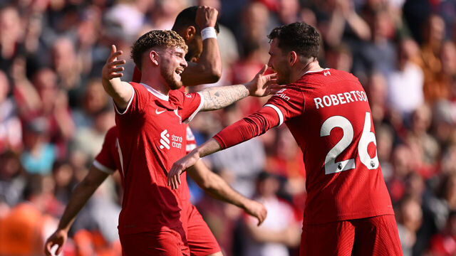 LIVERPOOL, ENGLAND - MAY 05: Andrew Robertson of Liverpool celebrates scoring his team's second goal with teammate Harvey Elliott during the Premier League match between Liverpool FC and Tottenham Hotspur at Anfield on May 05, 2024 in Liverpool, England.