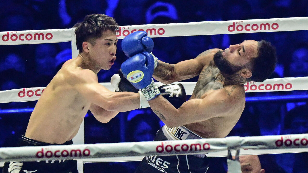 Japan's Naoya Inoue (L) fights against Mexico's Luis Nery during their IBF-WBA-WBC-WBO super-bantamweight title boxing match at the Tokyo Dome in Tokyo on May 6, 2024.