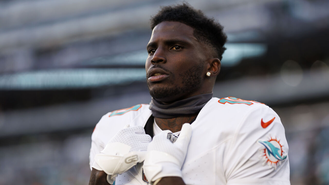 EAST RUTHERFORD, NEW JERSEY - NOVEMBER 24: Tyreek Hill #10 of the Miami Dolphins looks on during pregame warmups before an NFL football game against the New York Jets at MetLife Stadium on November 24, 2023 in East Rutherford, New Jersey.