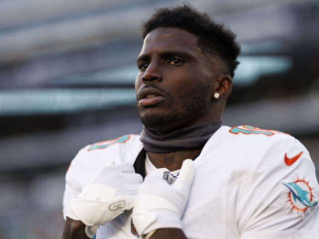 EAST RUTHERFORD, NEW JERSEY - NOVEMBER 24: Tyreek Hill #10 of the Miami Dolphins looks on during pregame warmups before an NFL football game against the New York Jets at MetLife Stadium on November 24, 2023 in East Rutherford, New Jersey.