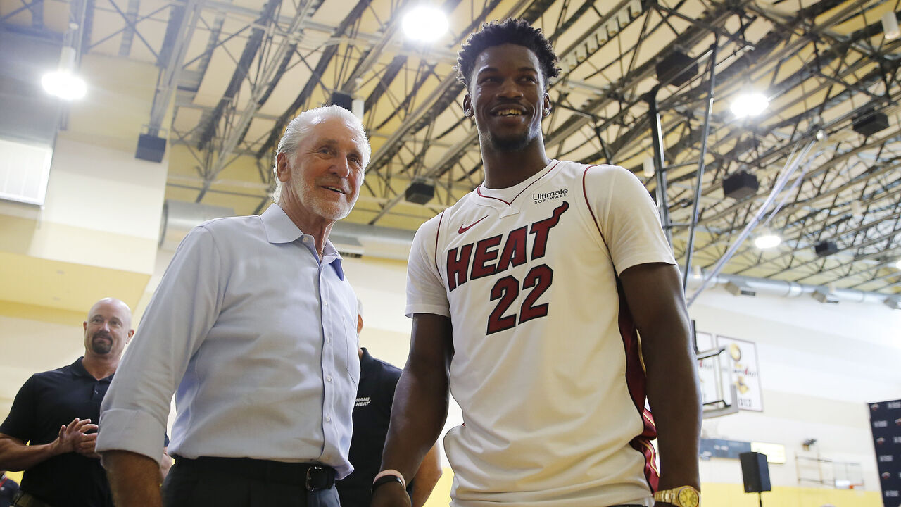 MIAMI, FLORIDA - SEPTEMBER 27: Jimmy Butler #22 of the Miami Heat shakes hands with president Pat Riley after his introductory press conference at American Airlines Arena on September 27, 2019 in Miami, Florida.
