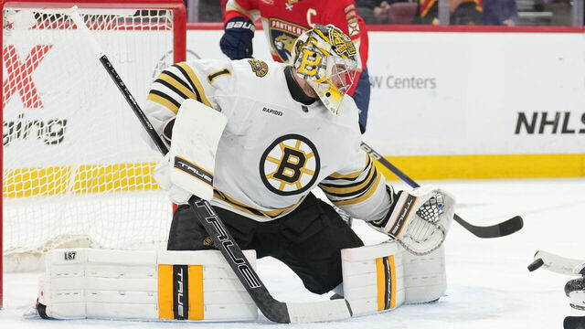 SUNRISE, FL - MAY 06: Florida Panthers left wing Matthew Tkachuk (19) tries to deflect the puck past Boston Bruins goaltender Jeremy Swayman (1) in the first period during game one of the Eastern Conference round 2 playoffs between the Boston Bruins and the Florida Panthers on Monday, May 6, 2024 at Amerant Bank Arena, Sunrise, Fla.