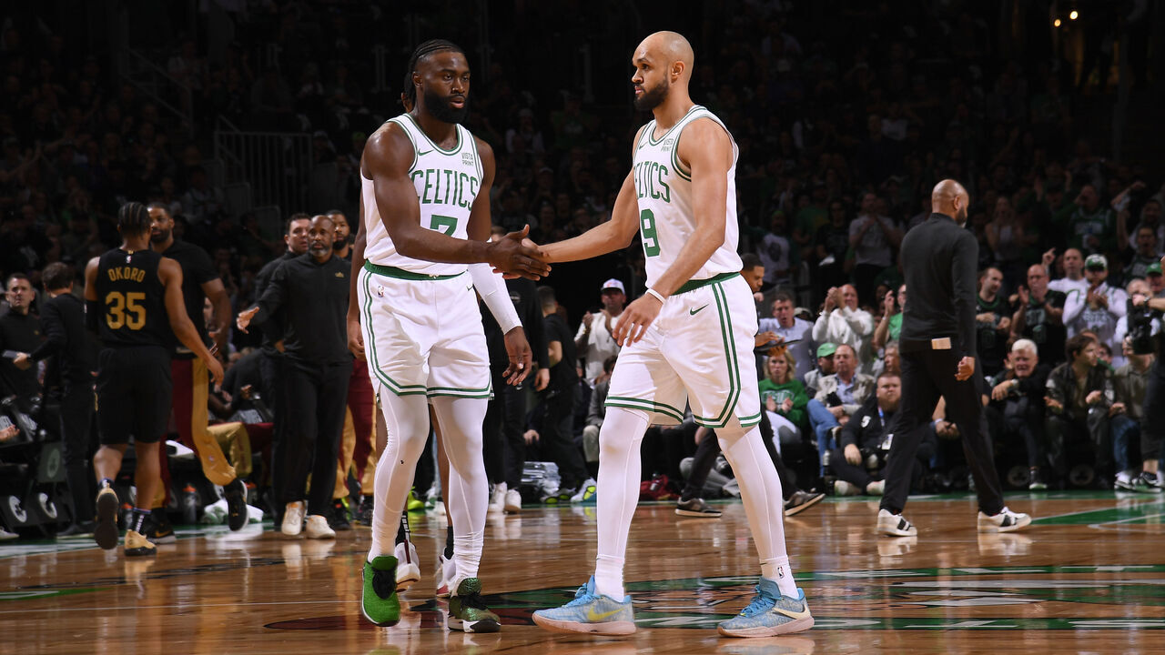 BOSTON, MA - MAY 7: Jaylen Brown #7 high fives Derrick White #9 of the Boston Celtics during the game against the Cleveland Cavaliers during Round 2 Game 1 on May 7, 2024 at the TD Garden in Boston, Massachusetts. Mandatory Copyright Notice: Copyright 2024 NBAE