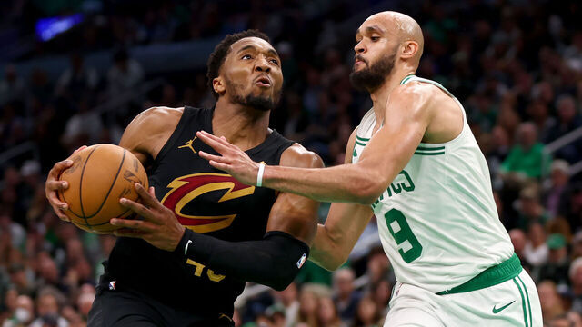 BOSTON, MASSACHUSETTS - MAY 07: Donovan Mitchell #45 of the Cleveland Cavaliers drives to the basket against Derrick White #9 of the Boston Celtics during the third quarter in Game One of the Eastern Conference Second Round Playoffs at TD Garden on May 07, 2024 in Boston, Massachusetts.