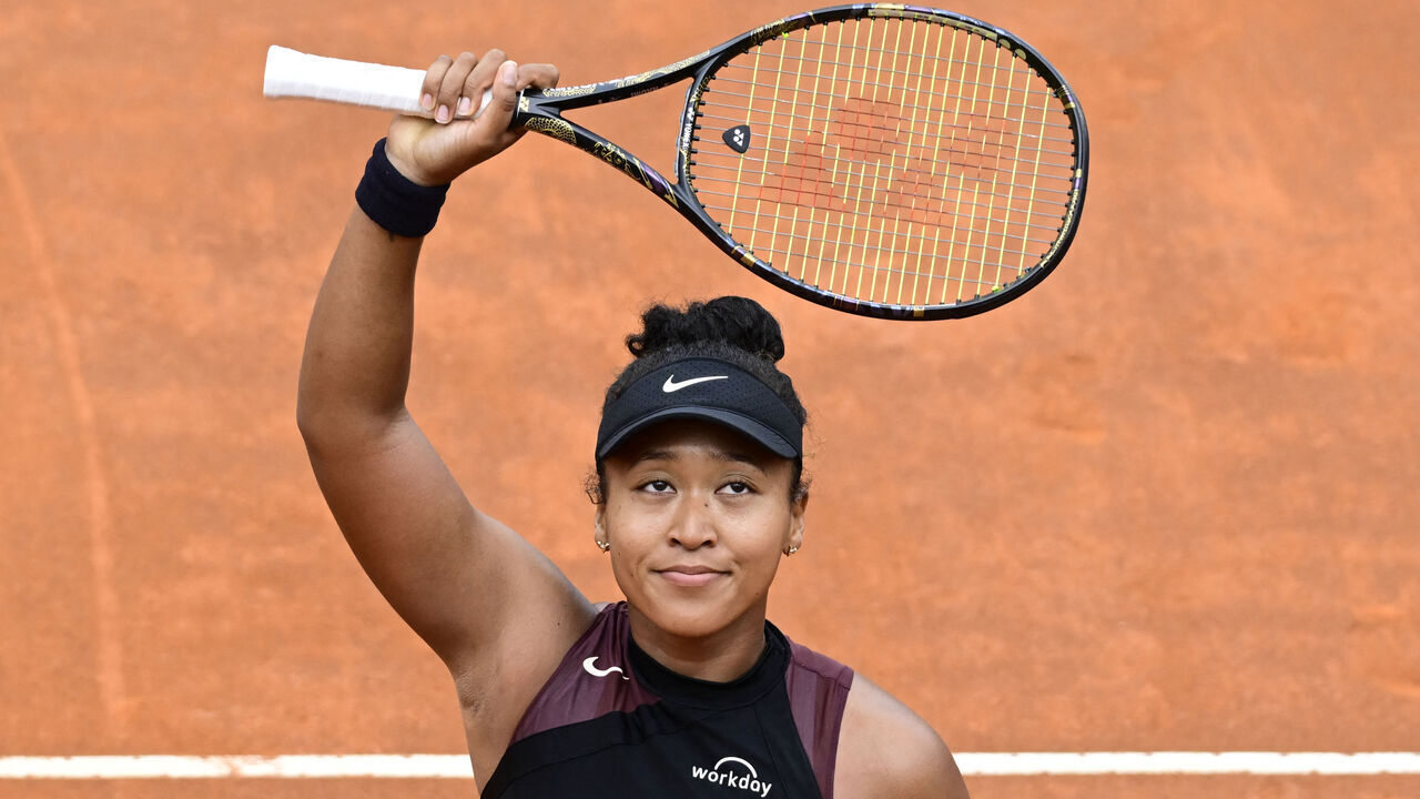 Japan's Naomi Osaka celebrates after winning against France's Clara Burel at the Women's WTA Rome Open tennis tournament at Foro Italico in Rome on May 8, 2024.