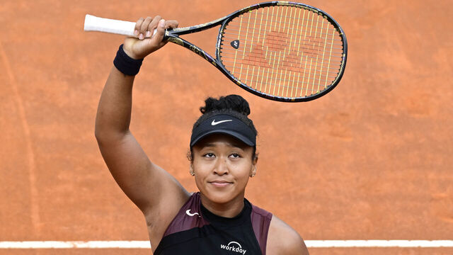Japan's Naomi Osaka celebrates after winning against France's Clara Burel at the Women's WTA Rome Open tennis tournament at Foro Italico in Rome on May 8, 2024.