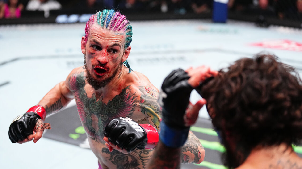 MIAMI, FLORIDA - MARCH 09: (L-R) Sean O'Malley punches Marlon Vera of Ecuador in the UFC bantamweight championship fight during the UFC 299 event at Kaseya Center on March 09, 2024 in Miami, Florida.