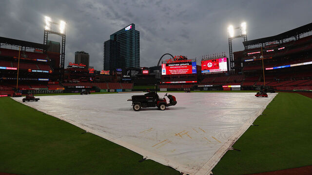 ST LOUIS, MISSOURI - MAY 8: Due to inclement weather, a tarp covers the field at a postponed game between the St. Louis Cardinals and the New York Mets at Busch Stadium on May 8, 2024 in St Louis, Missouri.