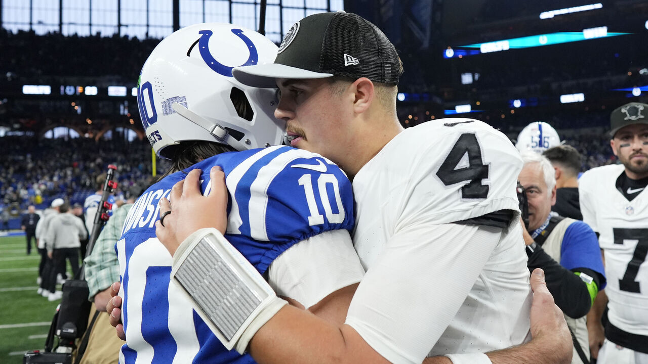 INDIANAPOLIS, INDIANA - DECEMBER 31: Gardner Minshew #10 of the Indianapolis Colts talks with Aidan O'Connell #4 of the Las Vegas Raiders after the game at Lucas Oil Stadium on December 31, 2023 in Indianapolis, Indiana.