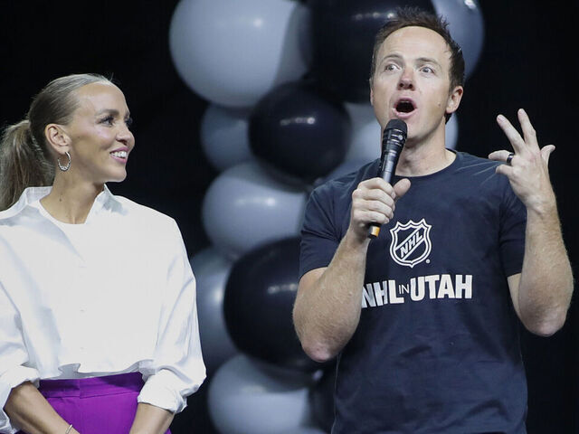 SALT LAKE CITY, UT - APRIL 24: (L-R) Team owners Ashley and Ryan Smith of the yet to be named NHL Utah hockey team speak before the players are introduced to the fans at the Delta Center on April 24, 2024 in Salt Lake City, Utah. The NHL has allowed the sale of the Arizona Coyotes and the team will relocate to Salt Lake City, Utah.