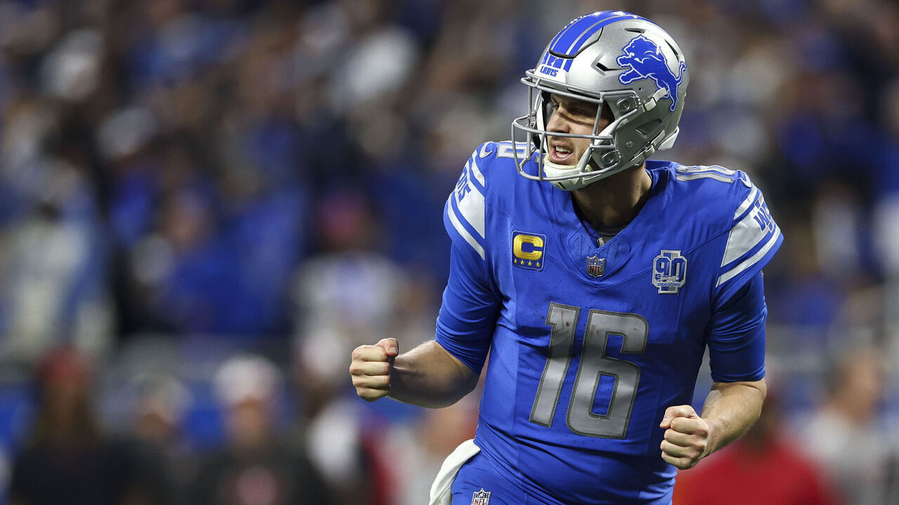 DETROIT, MI - JANUARY 21: Jared Goff #16 of the Detroit Lions celebrates after a touchdown during the third quarter of an NFL divisional round playoff football game against the Tampa Bay Buccaneers at Ford Field on January 21, 2024 in Detroit, Michigan.