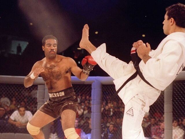 Jiu-Jitsu black belt Royce Gracie kicks at cruiserweight boxer Art Jimmerson during a 1st round match in the Ultimate Fighter Championships in Denver, Colorado. Gracie went on to win the match and eventually the championship. Mandatory Credit: Markus Boes