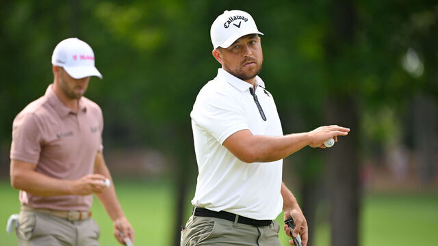CHARLOTTE, NORTH CAROLINA - MAY 10: Xander Schauffele waves his ball on the 12th green during the second round of Wells Fargo Championship at Quail Hollow Club on May 10, 2024 in Charlotte, North Carolina.