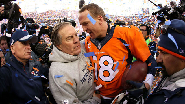 DENVER, CO - JANUARY 24: Peyton Manning #18 of the Denver Broncos and head coach Bill Belichick of the New England Patriots speak after the AFC Championship game at Sports Authority Field at Mile High on January 24, 2016 in Denver, Colorado. The Broncos defeated the Patriots 20-18.