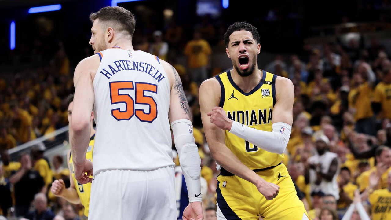 INDIANAPOLIS, INDIANA - MAY 10: Tyrese Haliburton #0 of the Indiana Pacers reacts after scoring a basket in front of Isaiah Hartenstein #55 of the New York Knicks in Game Three of the Eastern Conference Second Round Playoffs at Gainbridge Fieldhouse on May 10, 2024 in Indianapolis, Indiana.