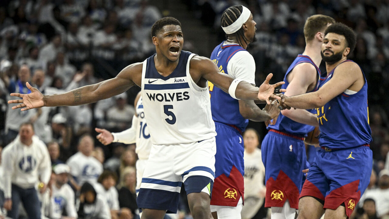 MINNEAPOLIS , MN - MAY 10: Anthony Edwards (5) of the Minnesota Timberwolves reacts to fouling Jamal Murray (27) of the Denver Nuggets during the second quarter at Target Center in Minneapolis, Minnesota on Friday, May 10, 2024.