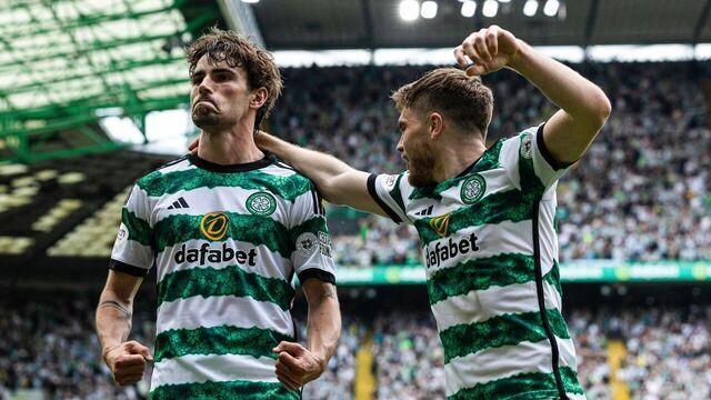 GLASGOW, SCOTLAND - MAY 11: Celtic's Matt O'Riley celebrates with James Forrest after scoring to make it 1-0 during a cinch Premiership match between Celtic and Rangers at Celtic Park, on May 11, 2024, in Glasgow, Scotland.