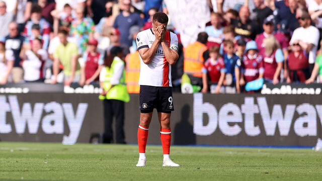 LONDON, ENGLAND - MAY 11: Carlton Morris of Luton Town reacts following defeat following the Premier League match between West Ham United and Luton Town at London Stadium on May 11, 2024 in London, England.
