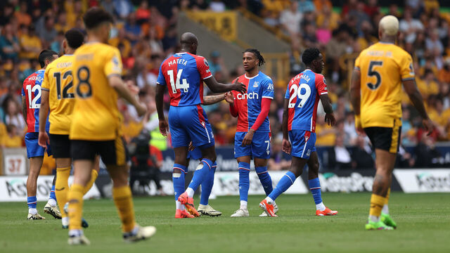 WOLVERHAMPTON, ENGLAND - MAY 11: Michael Olise of Crystal Palace celebrates scoring his team's first goal with teammate Jean-Philippe Mateta during the Premier League match between Wolverhampton Wanderers and Crystal Palace at Molineux on May 11, 2024 in Wolverhampton, England.
