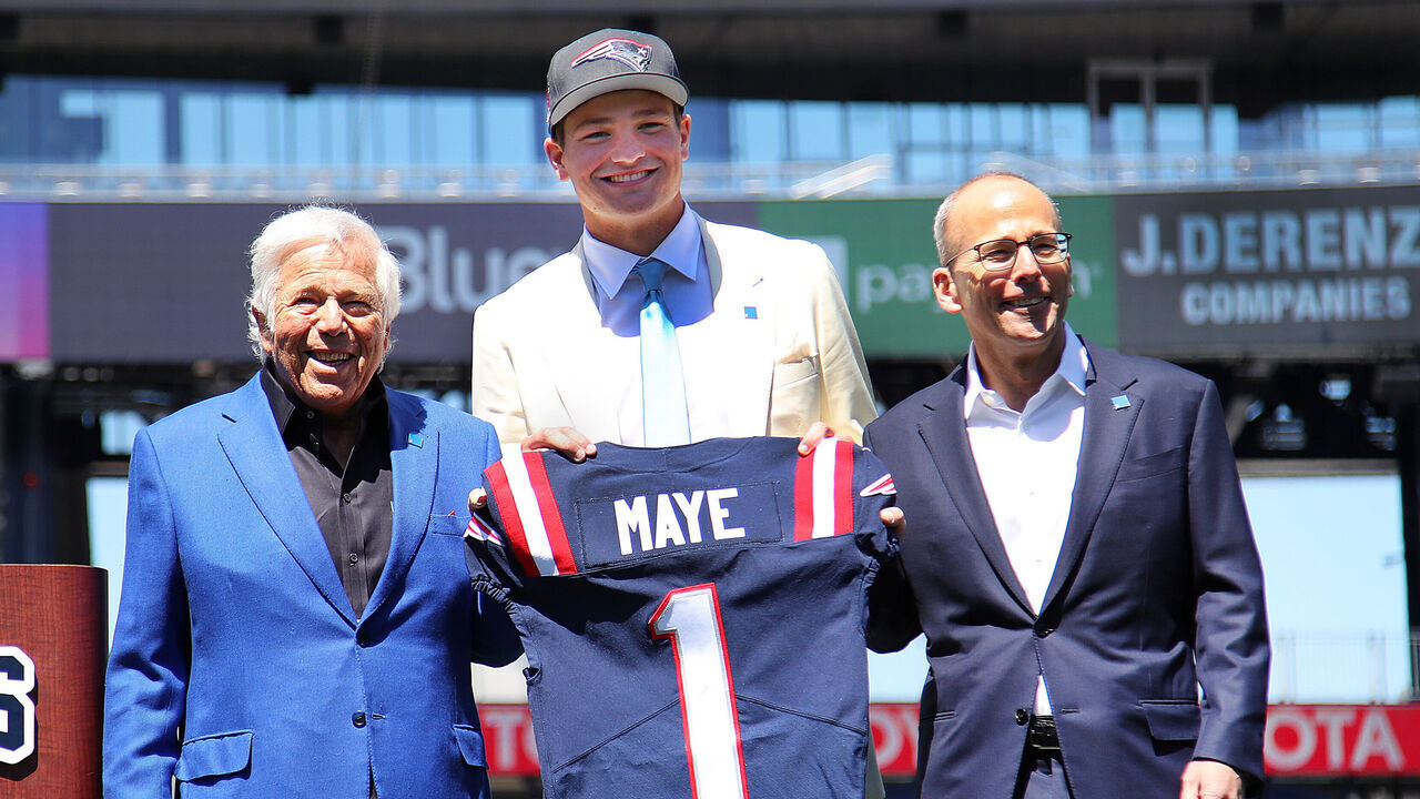 Foxborough, MA - April 26: New England Patriots QB Drake Maye, flanked by team owner Robert Kraft and team president Jonathan Kraft, is introduced at Gillette Stadium.