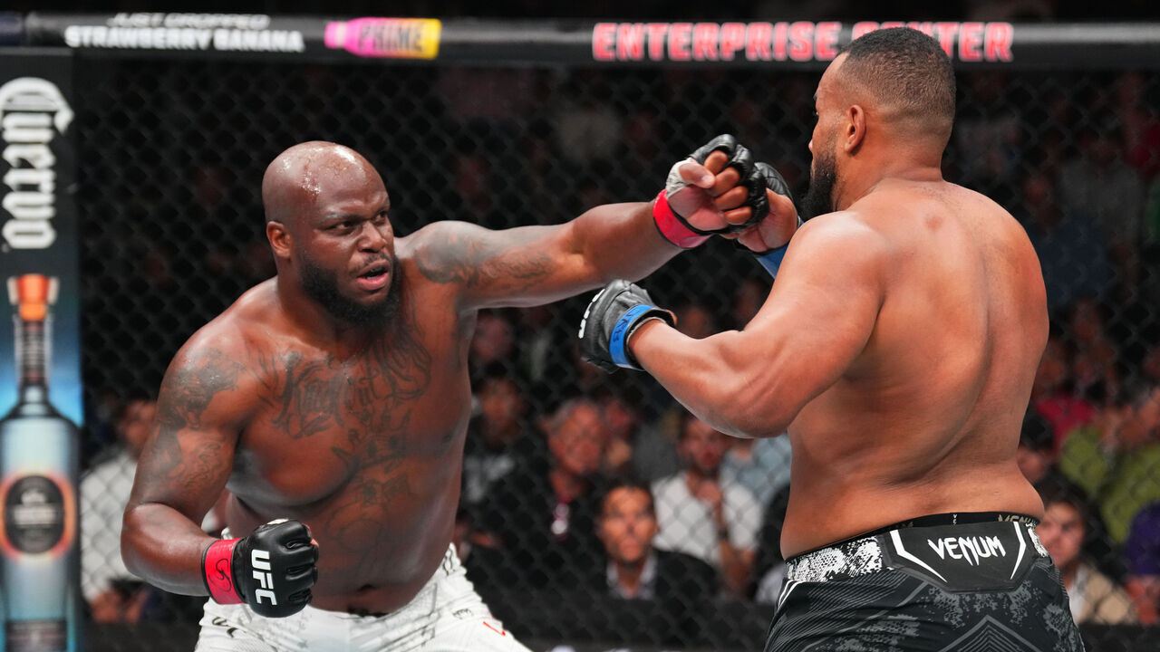 ST LOUIS, MISSOURI - MAY 11: (L-R) Derrick Lewis punches Rodrigo Nascimento of Brazil in a heavyweight fight during the UFC Fight Night event at Enterprise Center on May 11, 2024 in St Louis, Missouri.