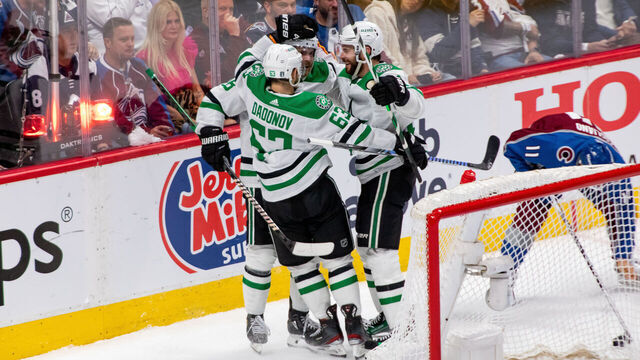 DENVER, COLORADO - MAY 11: Tyler Seguin #91 of the Dallas Stars (right) celebrates with teammates Sam Steel #18 (center) and Evgenii Dadonov #63 (left) after scoring a goal in the second period of Game Three of the Second Round of the Stanley Cup Playoffs against the Colorado Avalanche at Ball Arena on May 11, 2024 in Denver, Colorado.