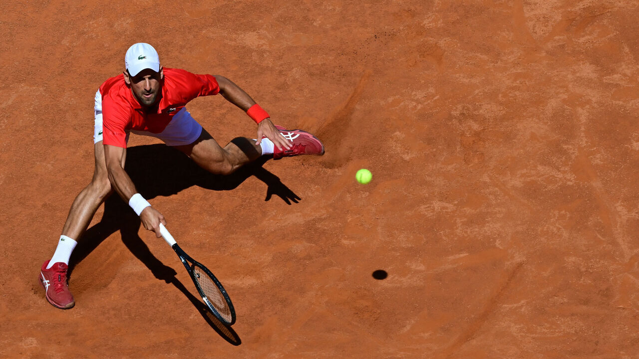 Serbia's Novak Djokovic returns to Chile's Alejandro Tabilo during the Men's ATP Rome Open tennis tournament at Foro Italico in Rome on May 12, 2024.