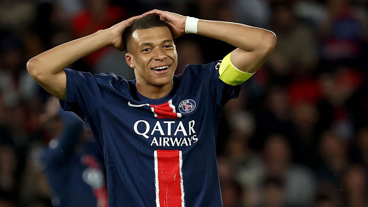 Paris Saint-Germain's French forward #07 Kylian Mbappe reacts after missing a goal opportunity during the French L1 football match between Paris Saint-Germain (PSG) and Toulouse (TFC) on May 12, 2024 at the Parc des Princes stadium in Paris.