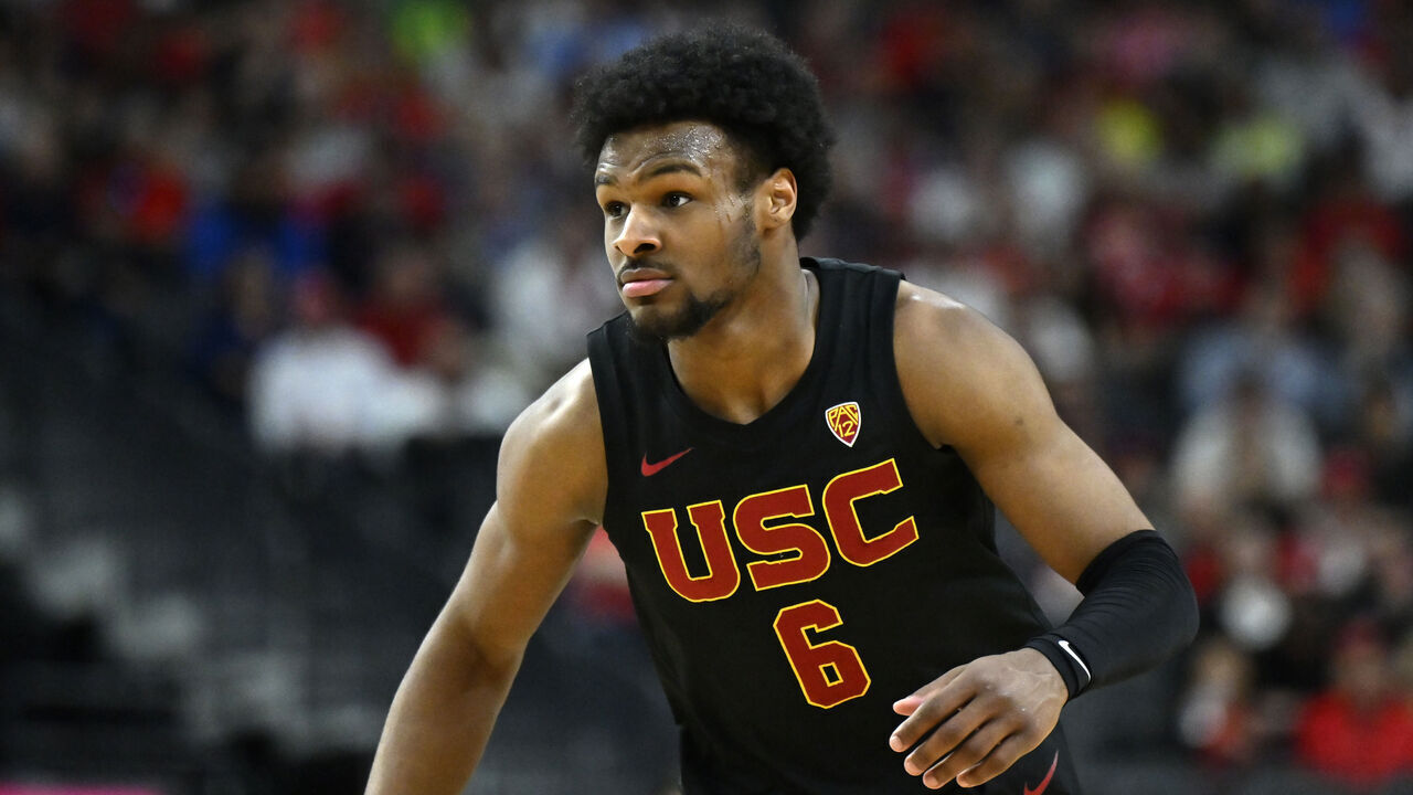 LAS VEGAS, NEVADA - MARCH 14: Bronny James #6 of the USC Trojans looks on in the second half of a quarterfinal game against the Arizona Wildcats during the Pac-12 Conference basketball tournament at T-Mobile Arena on March 14, 2024 in Las Vegas, Nevada. The Wildcats defeated the Trojans 70-49.