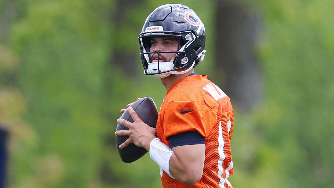 LAKE FOREST, ILLINOIS - MAY 10: Caleb Williams #18 of the Chicago Bears throws a pass during Chicago Bears Rookie Minicamp at Halas Hall on May 10, 2024 in Lake Forest, Illinois.