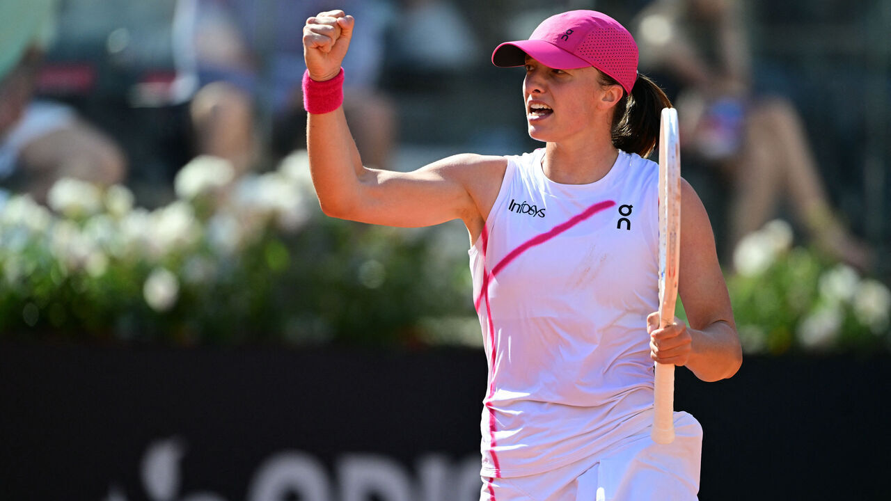 Poland's Iga Swiatek celebrates after winning the match against Germany's Angelique Kerber during the Women's WTA Rome Open tennis tournament at Foro Italico in Rome on May 13, 2024.