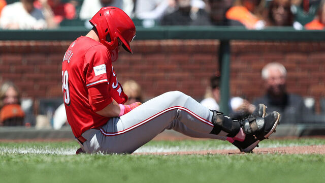 SAN FRANCISCO, CALIFORNIA - MAY 12: TJ Friedl #29 of the Cincinnati Reds sits on ground after getting hit by a pitch against the San Francisco Giants in the top of the first inning at Oracle Park on May 12, 2024 in San Francisco, California.
