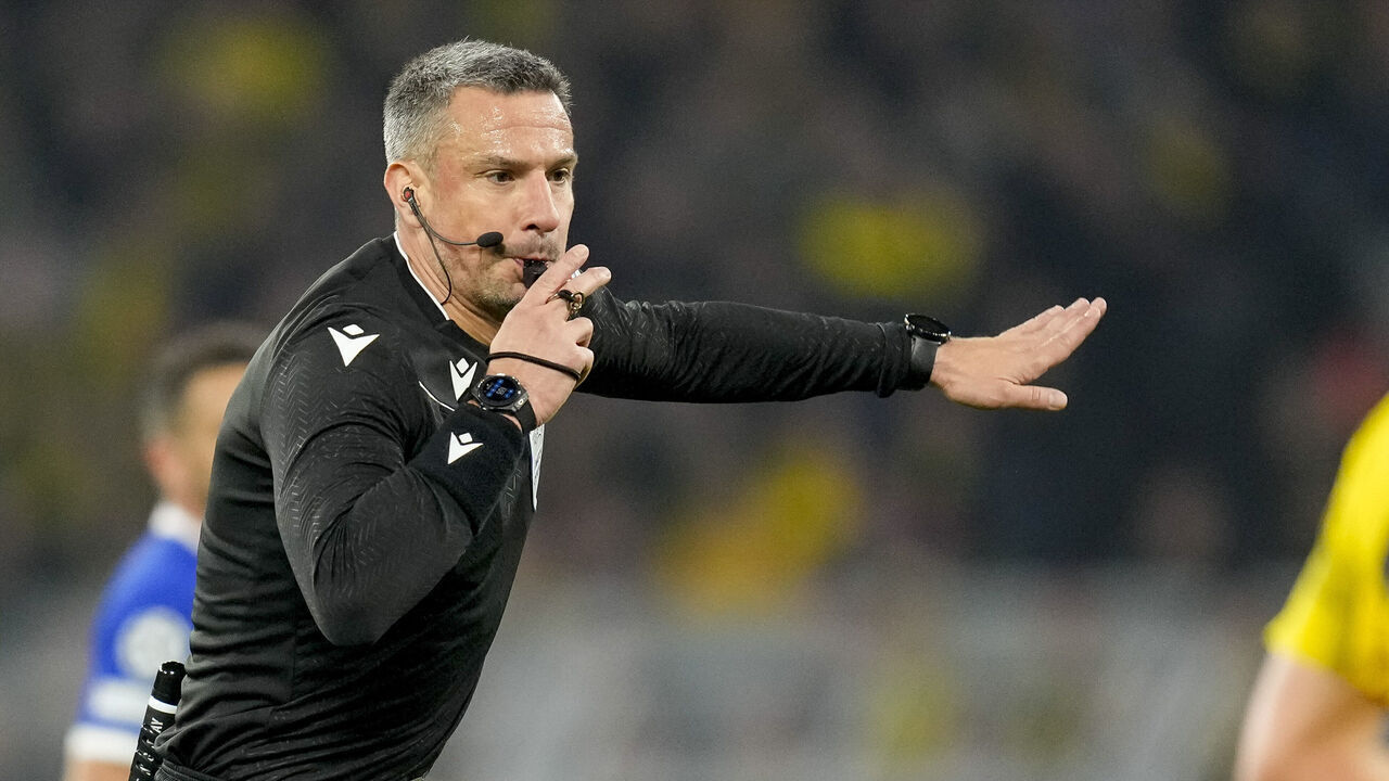 DORTMUND, GERMANY - APRIL 16: referee Slavko Vincic gestures during the UEFA Champions League quarter-final second leg match between Borussia Dortmund and Atletico Madrid at Signal Iduna Park on April 16, 2024 in Dortmund, Germany.