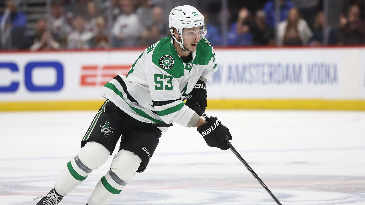 DENVER, COLORADO - MAY 13: Wyatt Johnston #53 of the Dallas Stars advances the puck against the Colorado Avalanche in the first period during Game Four of the Second Round of the 2024 Stanley Cup Playoffs at Ball Arena on May 13, 2024 in Denver, Colorado.