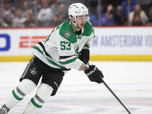 DENVER, COLORADO - MAY 13: Wyatt Johnston #53 of the Dallas Stars advances the puck against the Colorado Avalanche in the first period during Game Four of the Second Round of the 2024 Stanley Cup Playoffs at Ball Arena on May 13, 2024 in Denver, Colorado.