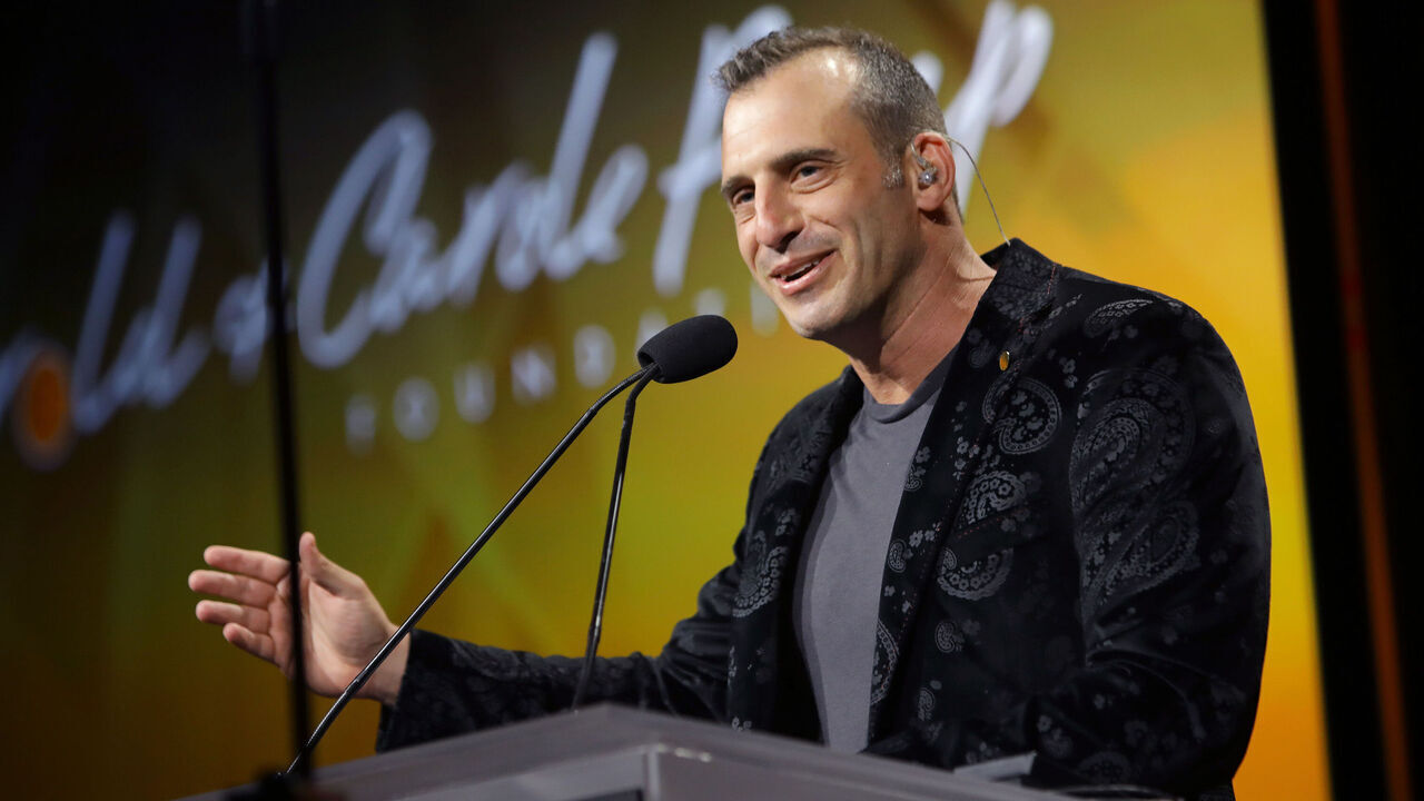 BEVERLY HILLS, CALIFORNIA - AUGUST 20: Doug Gottlieb speaks onstage at the 21st Annual Harold and Carole Pump Foundation Gala at The Beverly Hilton on August 20, 2021 in Beverly Hills, California.
