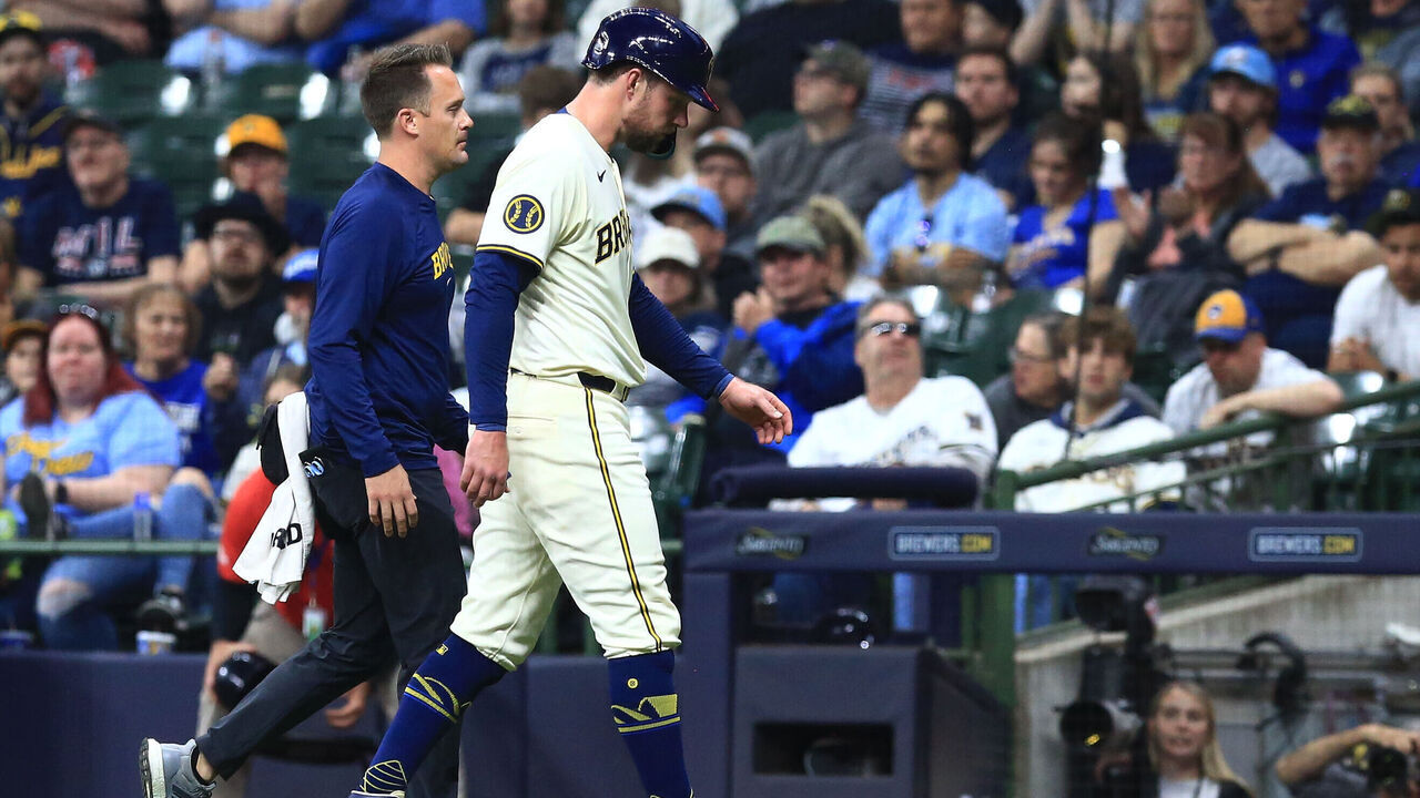 MILWAUKEE, WI - MAY 13: Milwaukee Brewers first base Rhys Hoskins (12) walks off the field after being injured during a game between the Milwaukee Brewers and the Pittsburgh Pirates on May 13, 2024, at American Family Field in Milwaukee, WI.