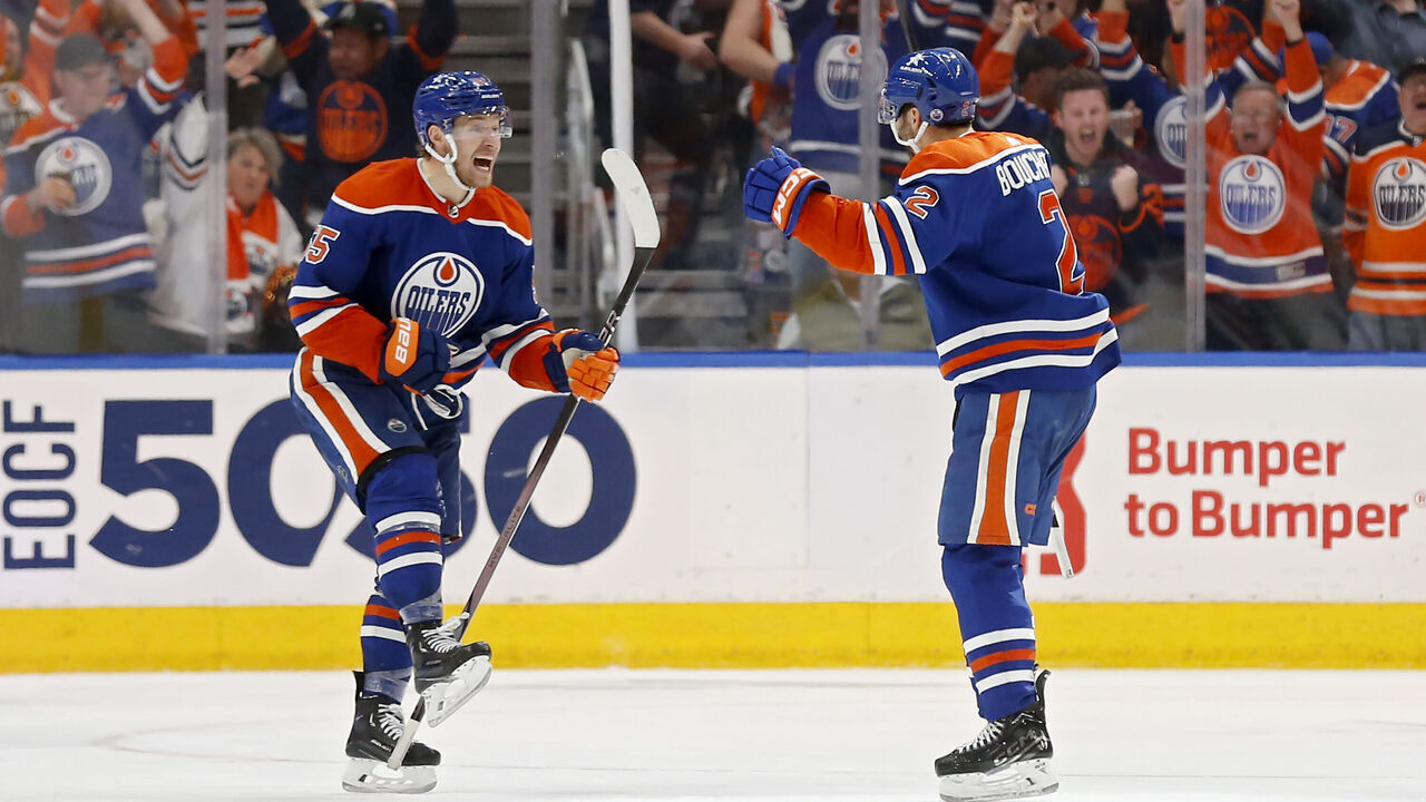EDMONTON, ALBERTA - MAY 14: Evan Bouchard #2 of the Edmonton Oilers celebrates with teammates after a goal during the third period against the Vancouver Canucks in Game Four of the Second Round of the 2024 Stanley Cup Playoffs at Rogers Place on May 14, 2024 in Edmonton, Alberta.
