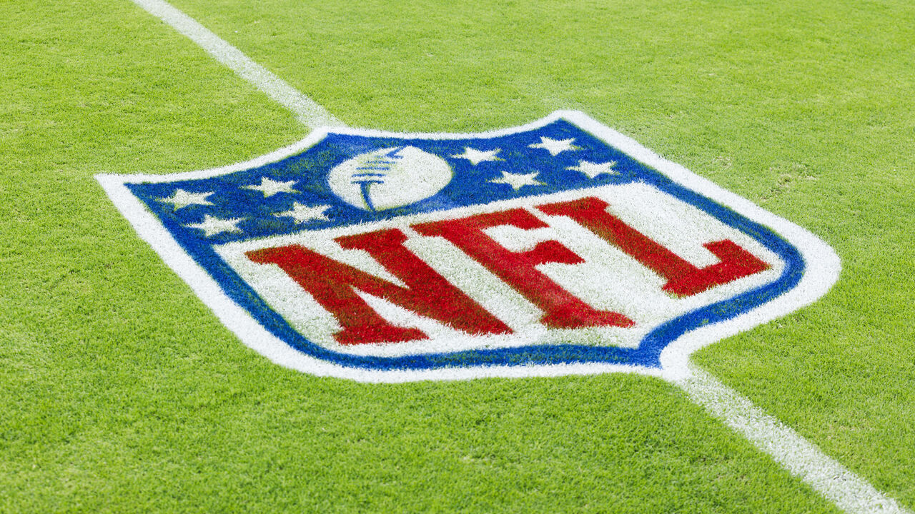 GLENDALE, ARIZONA - AUGUST 19: Detail view of an NFL Shield logo during a game between the Kansas City Chiefs and the Arizona Cardinals at State Farm Stadium on August 19, 2023 in Glendale, Arizona.