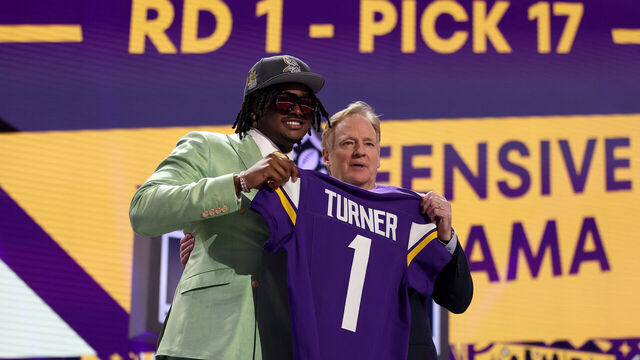 DETROIT, MICHIGAN - APRIL 25: (L-R) Dallas Turner poses with NFL Commissioner Roger Goodell after being selected 17th overall by the Minnesota Vikings during the first round of the 2024 NFL Draft at Campus Martius Park and Hart Plaza on April 25, 2024 in Detroit, Michigan.