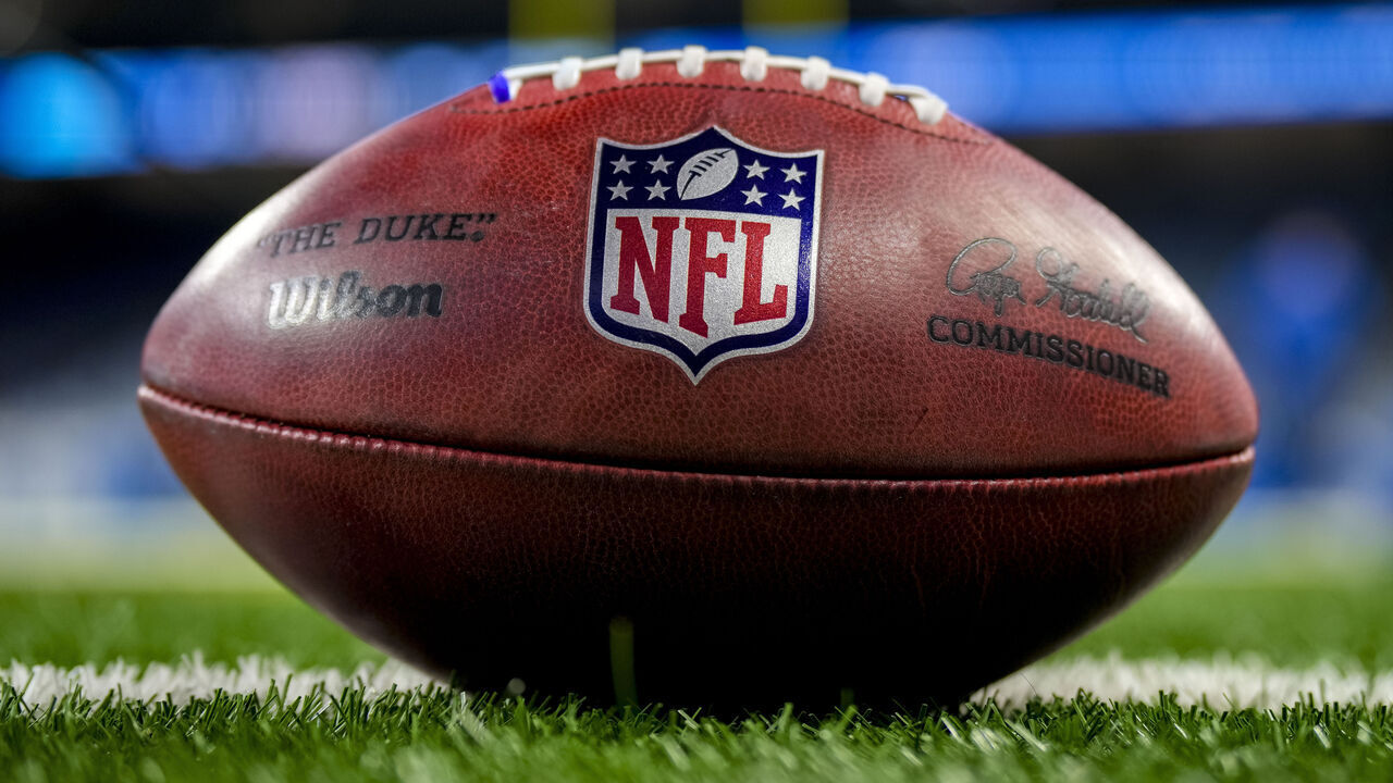 DETROIT, MICHIGAN - OCTOBER 08: The NFL logo is pictured on a Wilson brand football before the game between the Detroit Lions and Carolina Panthers at Ford Field on October 08, 2023 in Detroit, Michigan.
