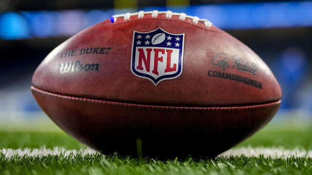 DETROIT, MICHIGAN - OCTOBER 08: The NFL logo is pictured on a Wilson brand football before the game between the Detroit Lions and Carolina Panthers at Ford Field on October 08, 2023 in Detroit, Michigan.