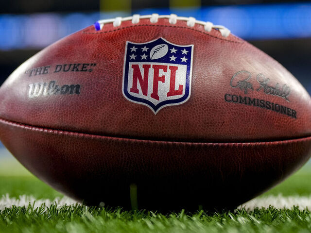 DETROIT, MICHIGAN - OCTOBER 08: The NFL logo is pictured on a Wilson brand football before the game between the Detroit Lions and Carolina Panthers at Ford Field on October 08, 2023 in Detroit, Michigan.